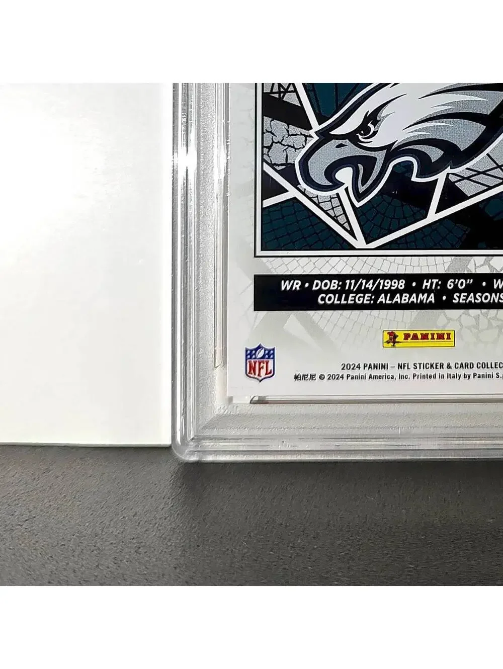 DeVonta Smith 2024 Panini Sticker Collection 048/299 #44 Red Foil PSA 9 Mint